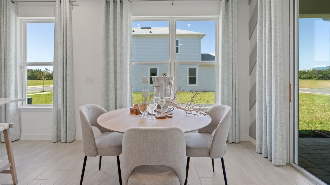 Trinity Place Staged Model Ambersweet Dining Area by DRB Homes in Saint Cloud FL Trinity Place Staged Model Ambersweet Dining Area by DRB Homes in Saint Cloud FL