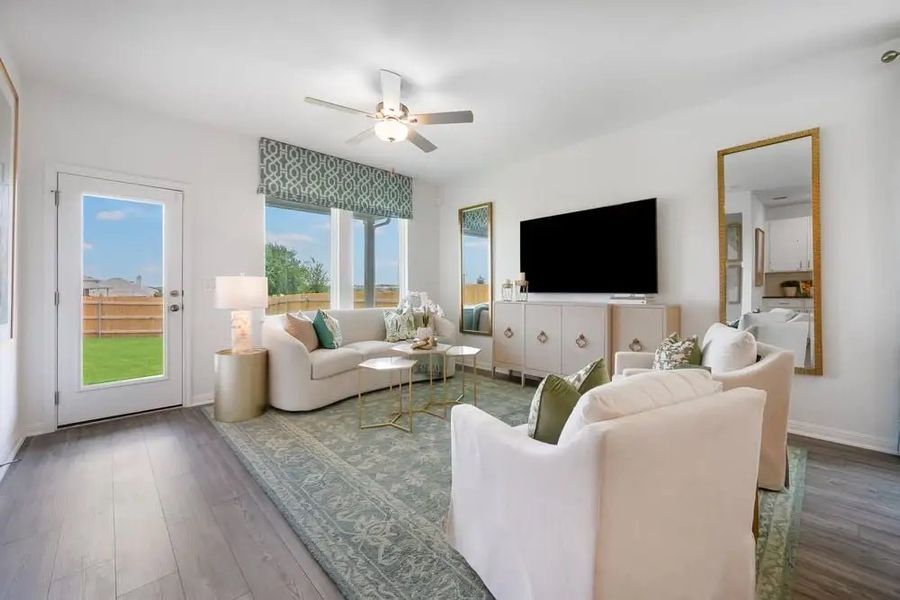 Furnished interior in a model home at Village Grove in Dripping Springs (Image 13).