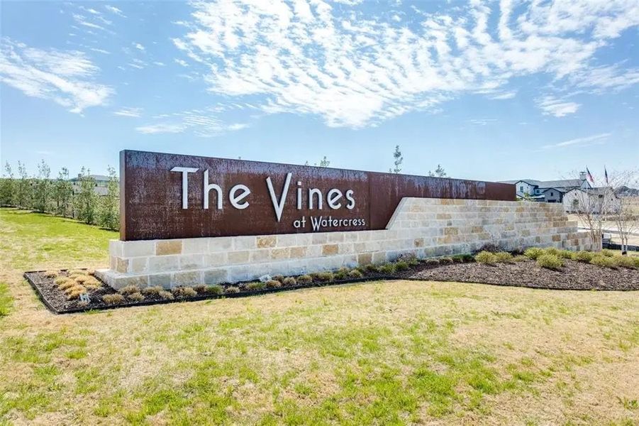 Main entrance to the The Vines master-planned community in Haslet, TX, featuring its landmark signage (Image 8). Main entrance to the The Vines master-planned community in Haslet, TX, featuring its landmark signage (Image 8).