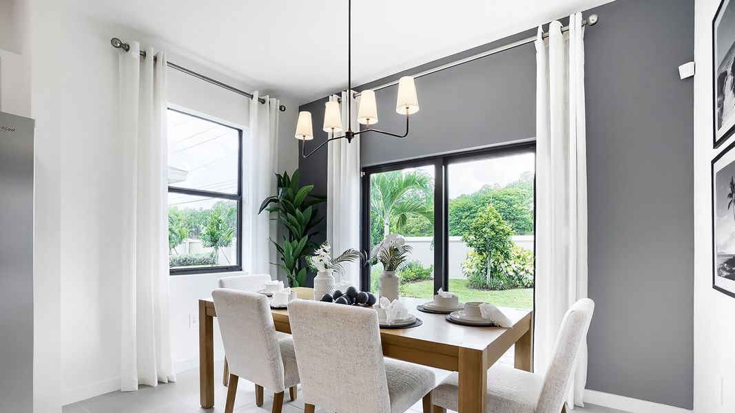 Furnished interior in a model home at Juniper Cove in Homestead (Image 7).