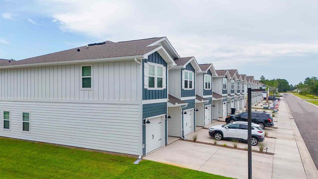 Front exterior of a home in the Hawks Landing Townhomes community, located in Santa Rosa Beach, FL (Image 7).