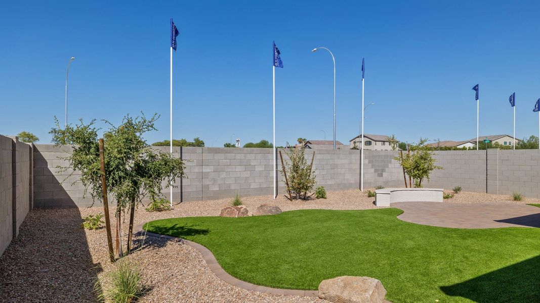 Front exterior of a home in the Del Rio Ranch community, located in Avondale, AZ (Image 11).