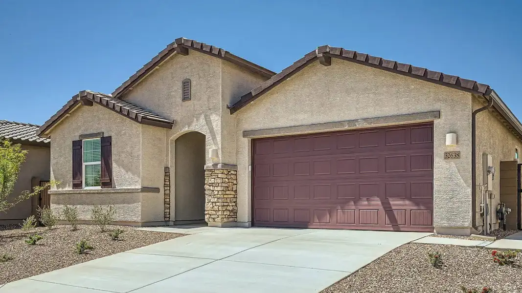 Front exterior of a home in the Bella Vista Farms: Gateway IV community, located in San Tan Valley, AZ (Image 13).