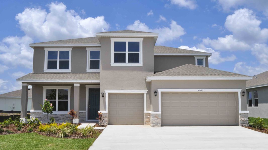 Front exterior of a home in the Oakfield Trails community, located in Parrish, FL (Image 2).