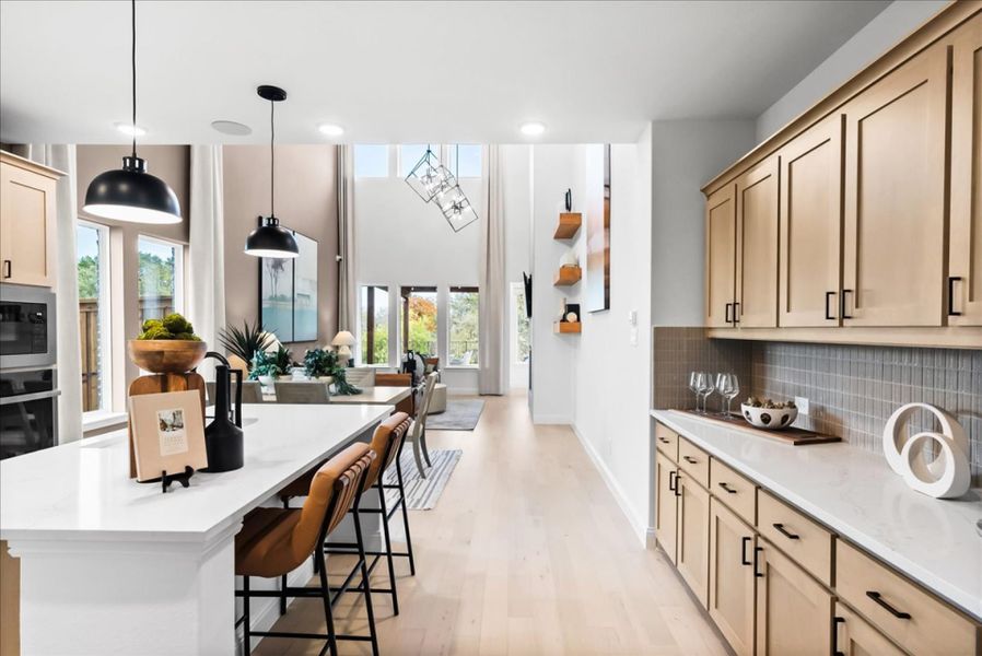 Furnished interior in a model home at The Reserve at Spiritas Ranch in Little Elm (Image 24).