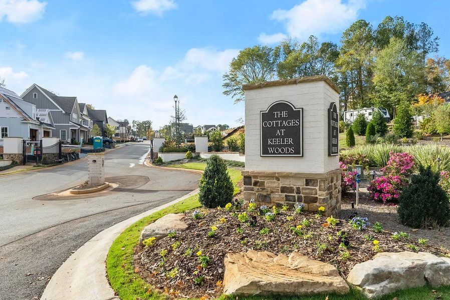 Entrance to the The Cottages at Keeler Woods community in Marietta, GA, featuring signage and landscaping (Image 12).