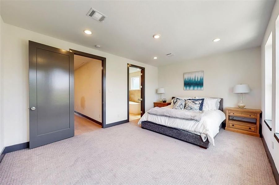 Furnished interior in a model home at Edwards in The Woodlands (Image 8).