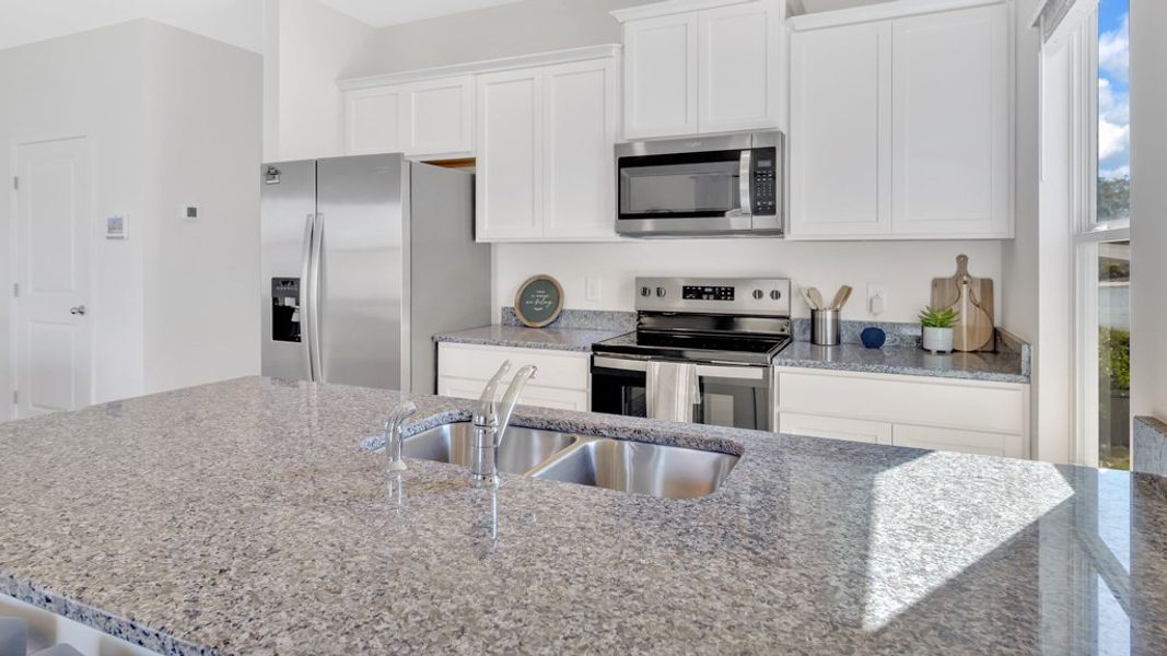 Furnished interior in a model home at Cherokee Crossing in Kodak (Image 33).