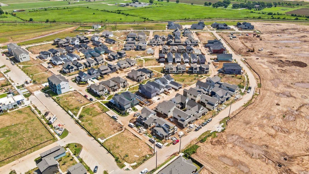 Aerial view of the Indigo: 40ft. lots community in Richmond, TX, showing layout and nearby surroundings (Image 15). Aerial view of the Indigo: 40ft. lots community in Richmond, TX, showing layout and nearby surroundings (Image 15).