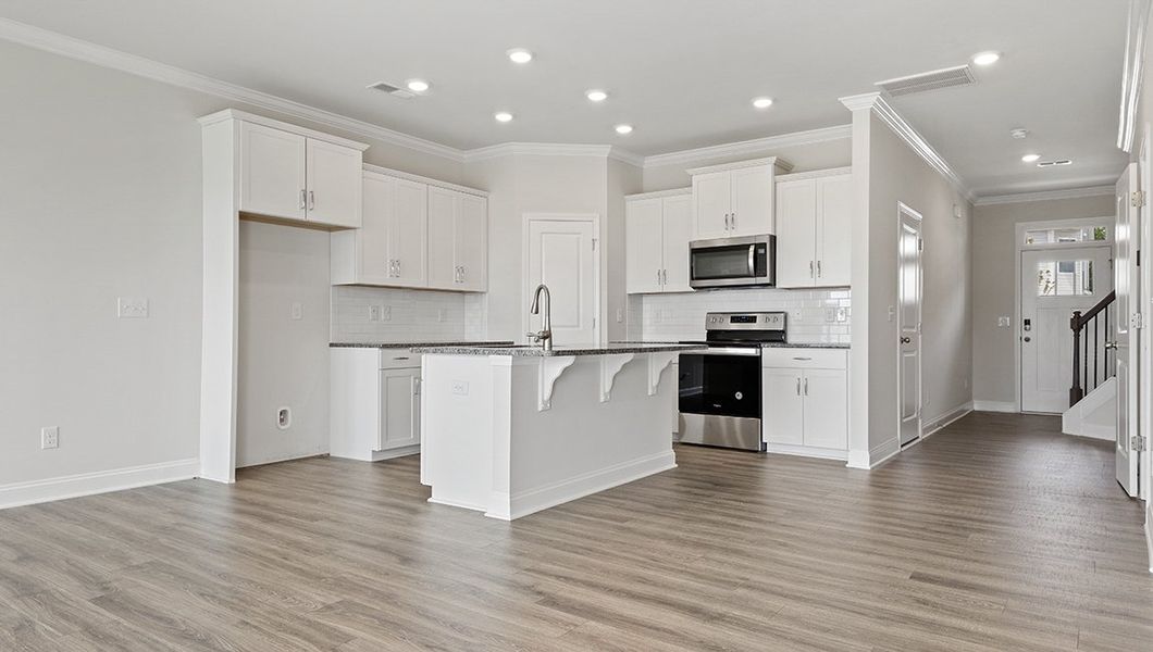 Furnished interior in a model home at Hidden Hills in Spartanburg (Image 5).