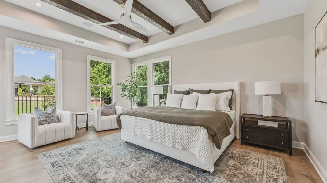Furnished interior in a model home at The Courtyards at Post Road in Cumming (Image 18).
