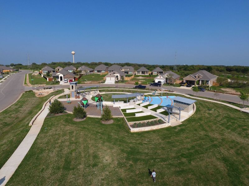 Aerial view of the La Cima: 50ft. lots community in San Marcos, TX, showing layout and nearby surroundings (Image 11). Aerial view of the La Cima: 50ft. lots community in San Marcos, TX, showing layout and nearby surroundings (Image 11).