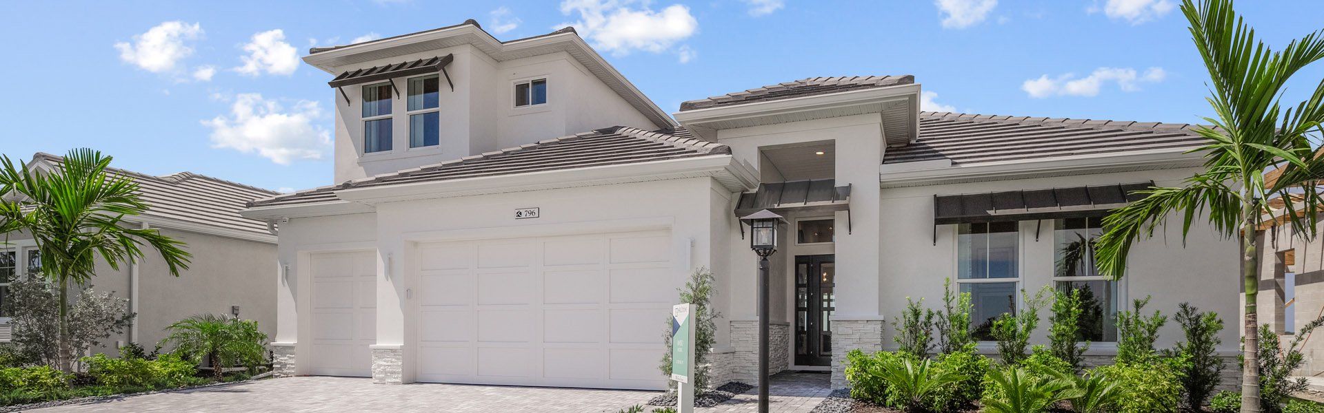 Front exterior of a home in the Shellstone at Waterside community, located in Sarasota, FL (Image 5).