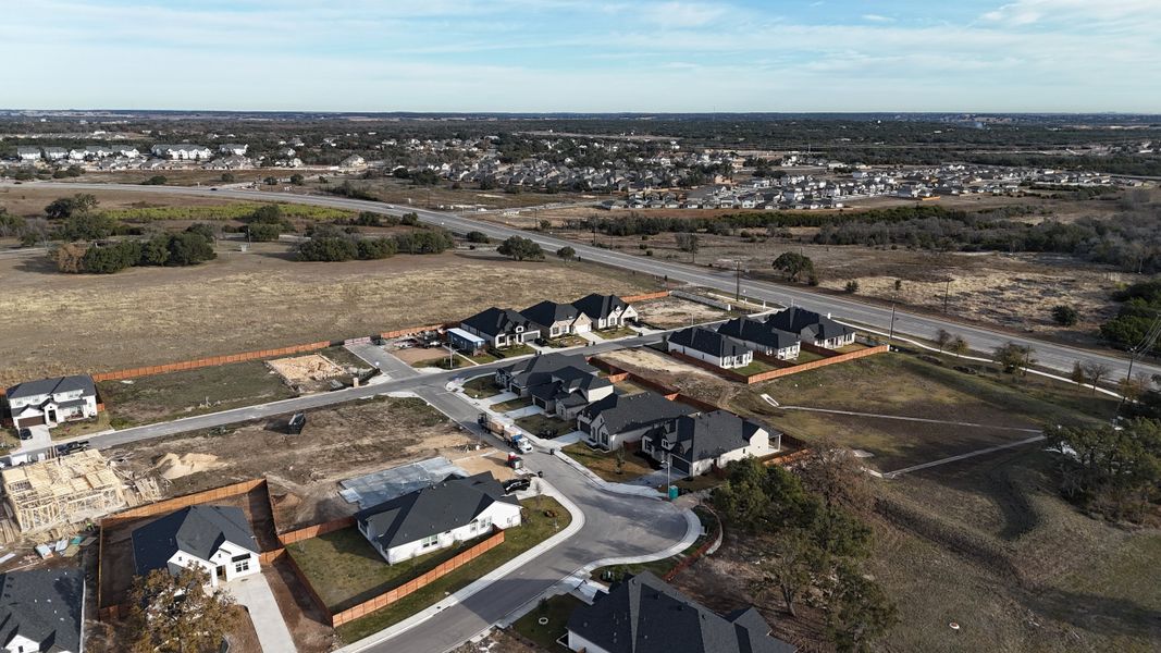Newly developed homes with spacious yards in Broken Oak by Highland Homes (Georgetown, TX).