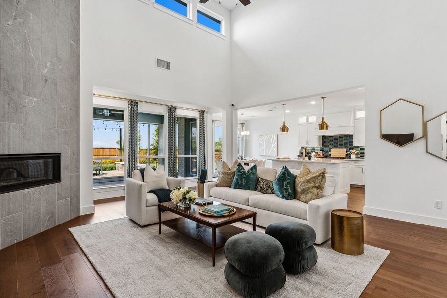 American Legend Homes' 60' model in Ten Mile Creek - Living Room/Kitchen American Legend Homes' 60' model in Ten Mile Creek - Living Room/Kitchen