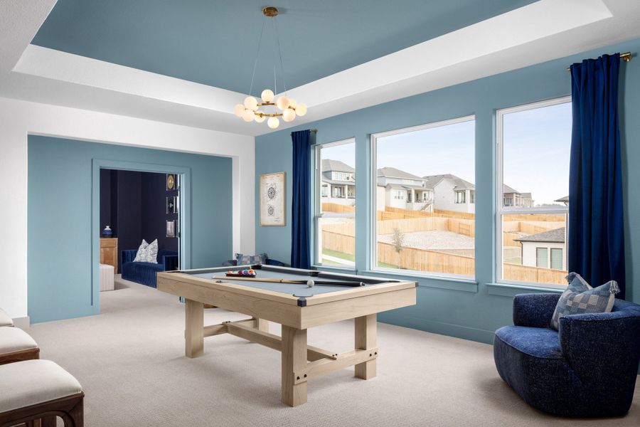 Furnished interior in a model home at Palmera Ridge in Leander (Image 31).