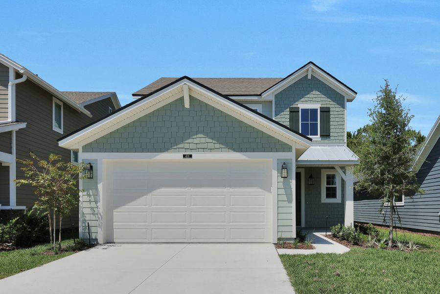 Front exterior of a home in the Mariposa at EverRange community, located in Jacksonville, FL (Image 10).