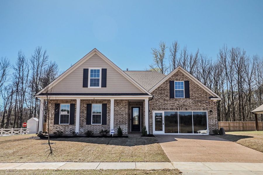 Front exterior of a home in the Villages of Green Meadows community, located in Munford, TN (Image 2).
