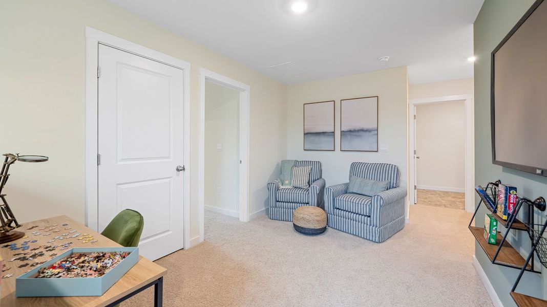 Furnished interior in a model home at Prairie Pass in Apison (Image 14).