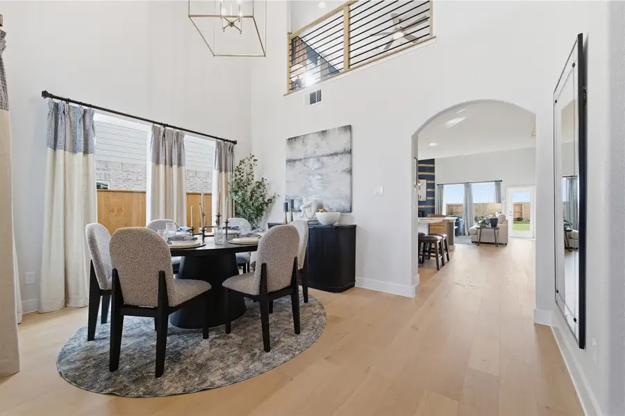 Furnished interior in a model home at Wildrye in Waller (Image 8).