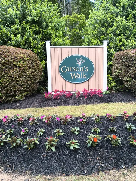 Entrance to the Carson's Walk community in Macon, GA, featuring signage and landscaping (Image 1).