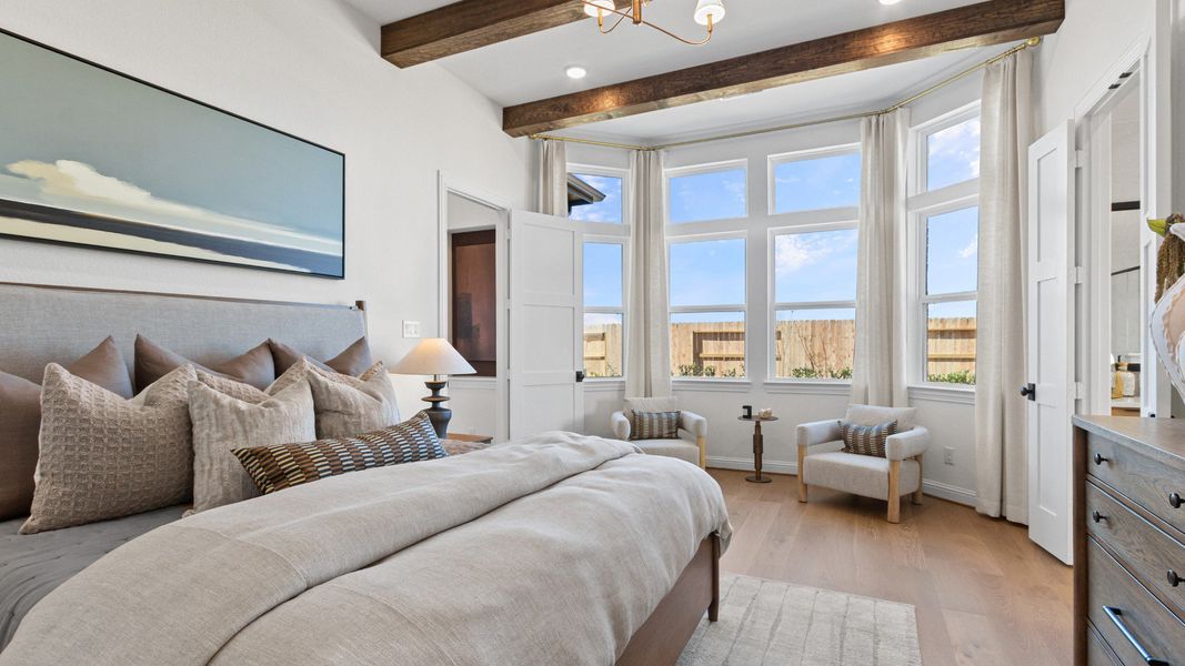 Furnished interior in a model home at Wildrye in Waller (Image 24).