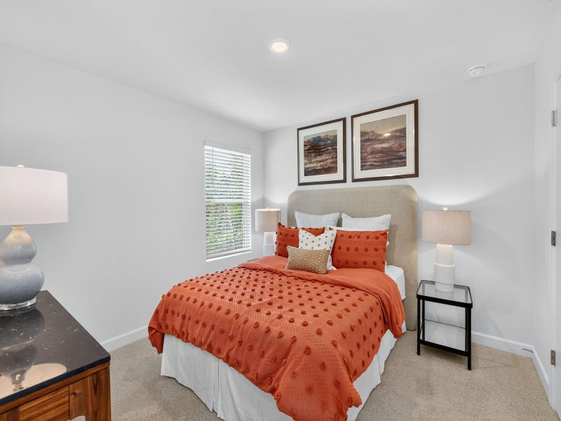 The Dakota floorplan includes three secondary bedrooms.