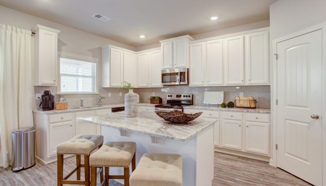 Furnished interior in a model home at Cove Lake Estates in Conley (Image 11).