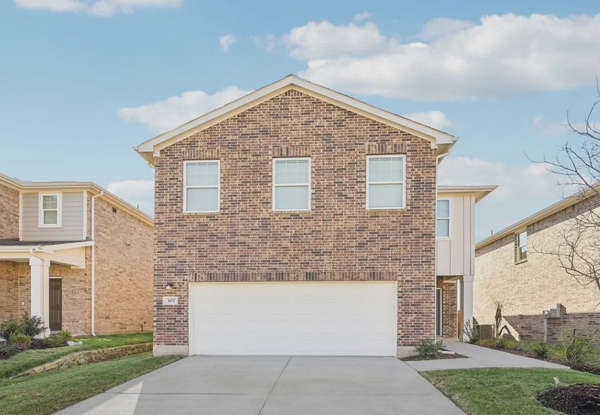 Front exterior of a home in the Chapel Run community, located in Montgomery, TX (Image 3).