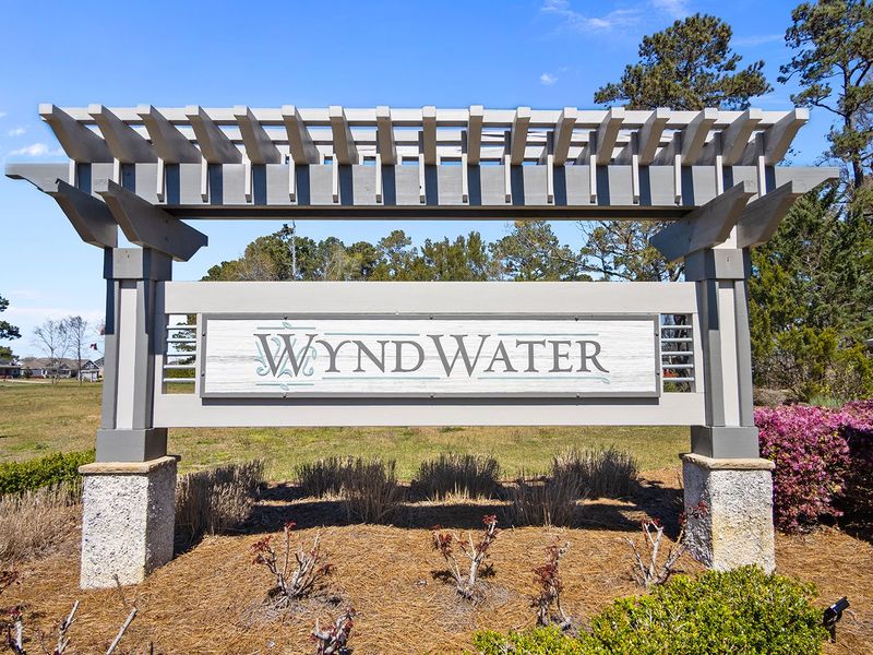 Entrance to the WyndWater community in Hampstead, NC, featuring signage and landscaping (Image 2).