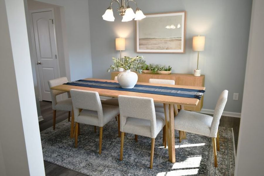 Furnished interior in a model home at Brassfield Meadows in Burlington (Image 38).