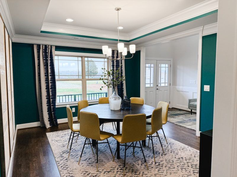 Furnished interior in a model home at Blacksmith in Stokesdale (Image 38).