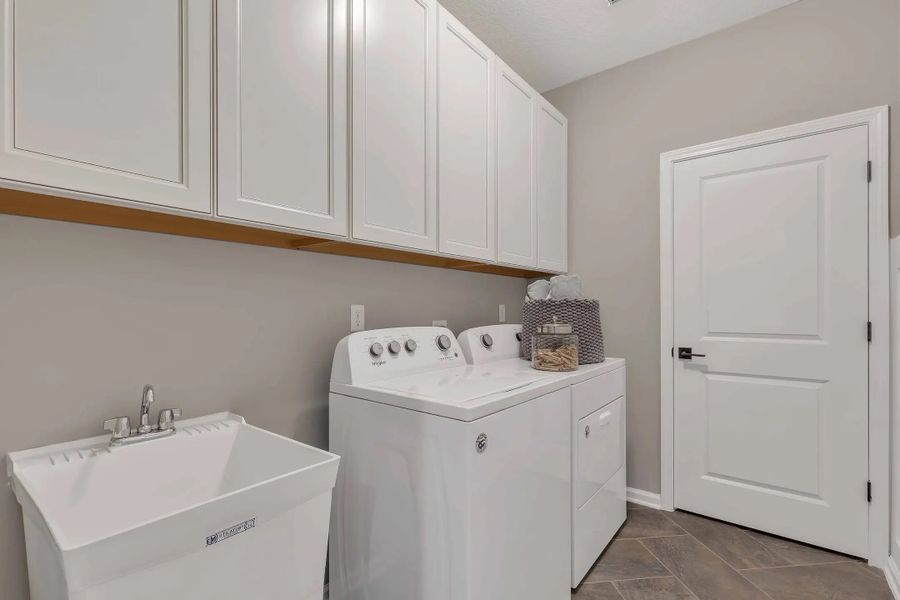 Furnished interior in a model home at Wilford Preserve 50' in Orange Park (Image 16).