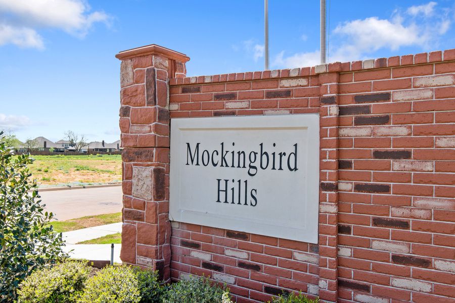 Entrance to the Mockingbird Hills community in Joshua, TX, featuring signage and landscaping (Image 2).