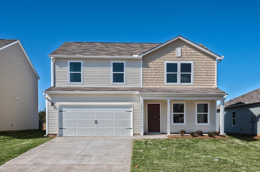 A house with a garage. A house with a garage.