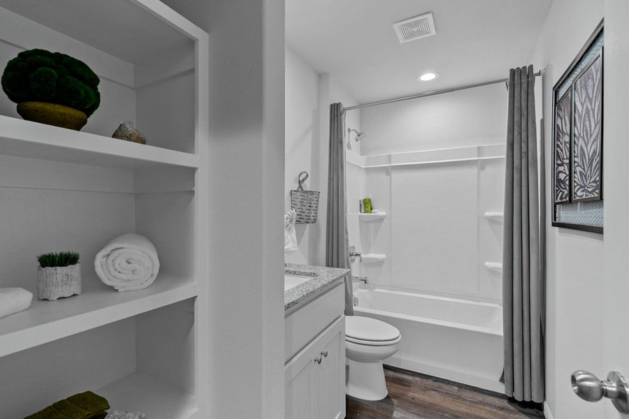 Furnished interior in a model home at Faculty Row in Abilene (Image 29).