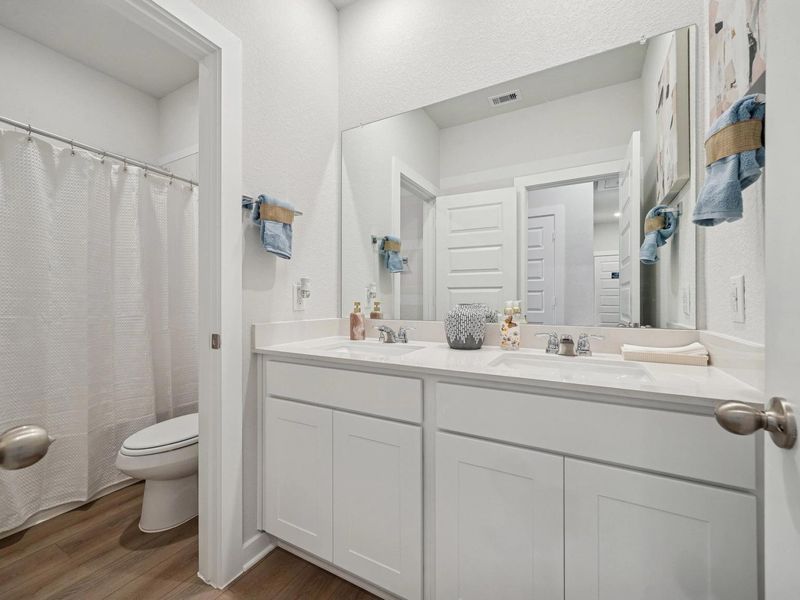 Furnished interior in a model home at Spring Branch Crossing in Conroe (Image 33).