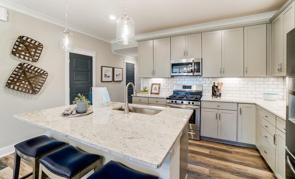 Furnished interior in a model home at CraigStone in Woodruff (Image 18).