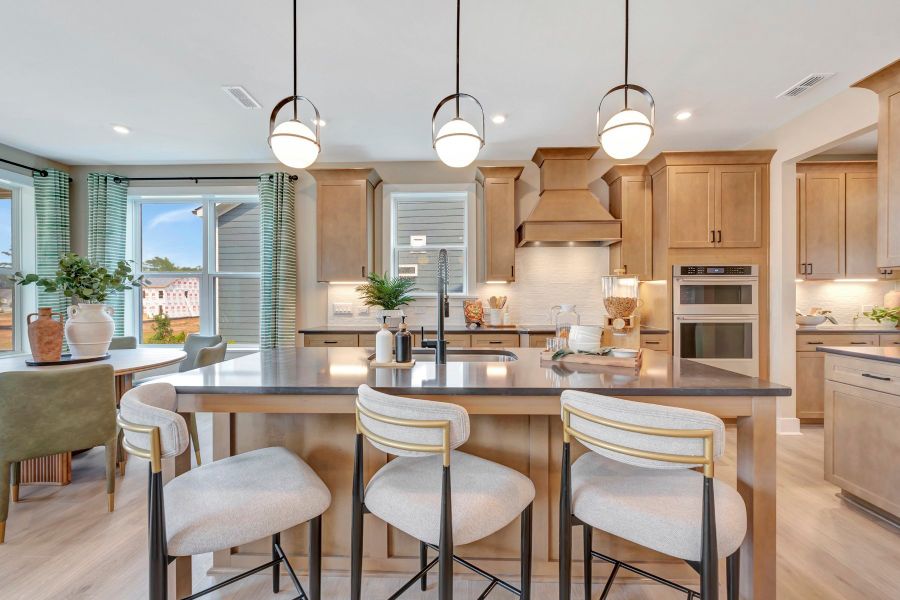 Furnished interior in a model home at Friendship Village in Apex (Image 4).