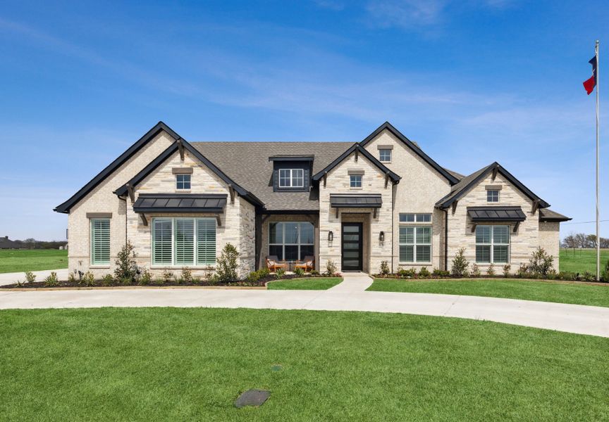 Front exterior of a home in the The Meadows community, located in Gunter, TX (Image 2).