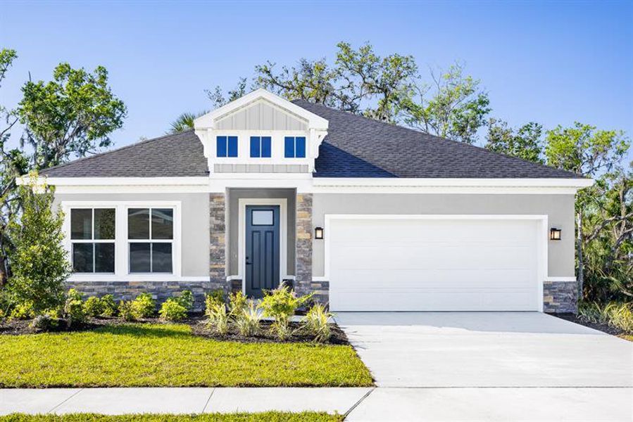 Front exterior of a home in the Silver Oaks community, located in Port St. Lucie, FL (Image 11).