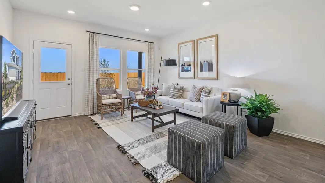 Furnished interior in a model home at The Reserve at Spiritas Ranch in Little Elm (Image 6).