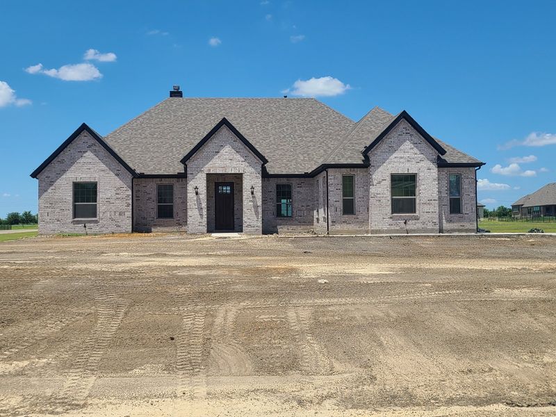 A beautiful brick home with a classic design in Sterling Meadows by Stonehollow Homes (Howe, TX). A beautiful brick home with a classic design in Sterling Meadows by Stonehollow Homes (Howe, TX).