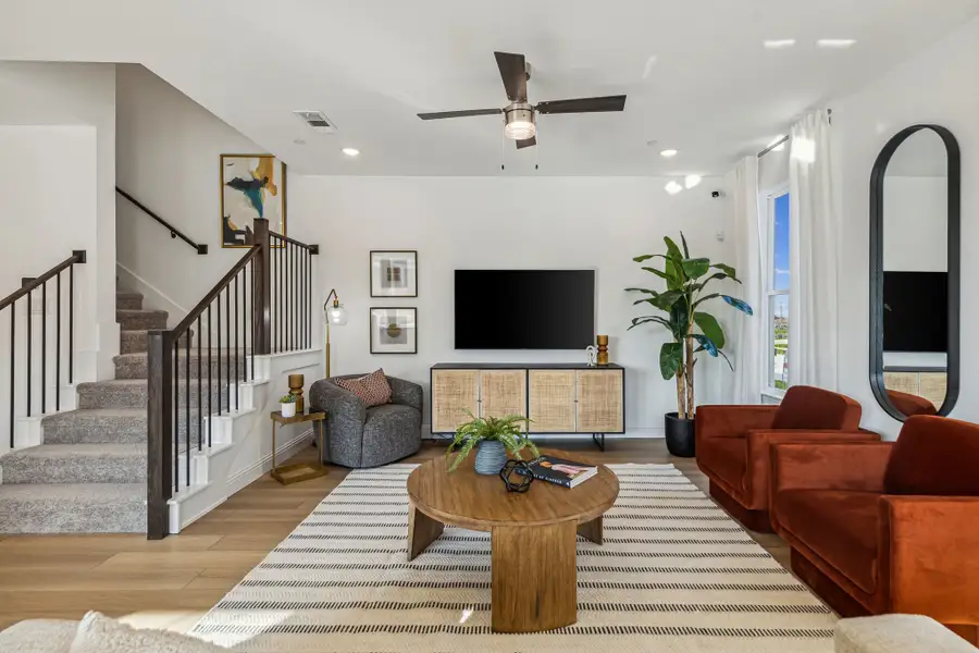 Furnished interior in a model home at Village on Main Street in Frisco (Image 7).