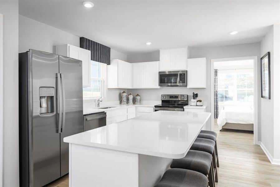 Furnished interior in a model home at Middle Creek Village Coastal Cottages & Villas in Bolivia (Image 7).