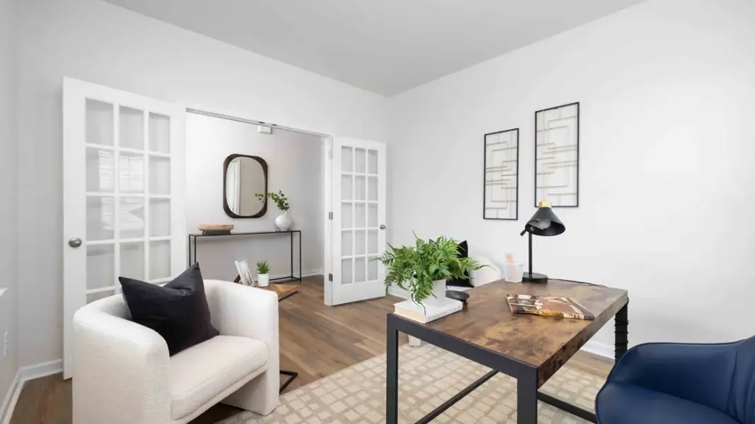 Furnished interior in a model home at Sweetwater Village in Rockwell (Image 4).