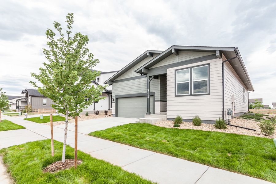 Front exterior of a home in the Trailside community, located in Timnath, CO (Image 19).