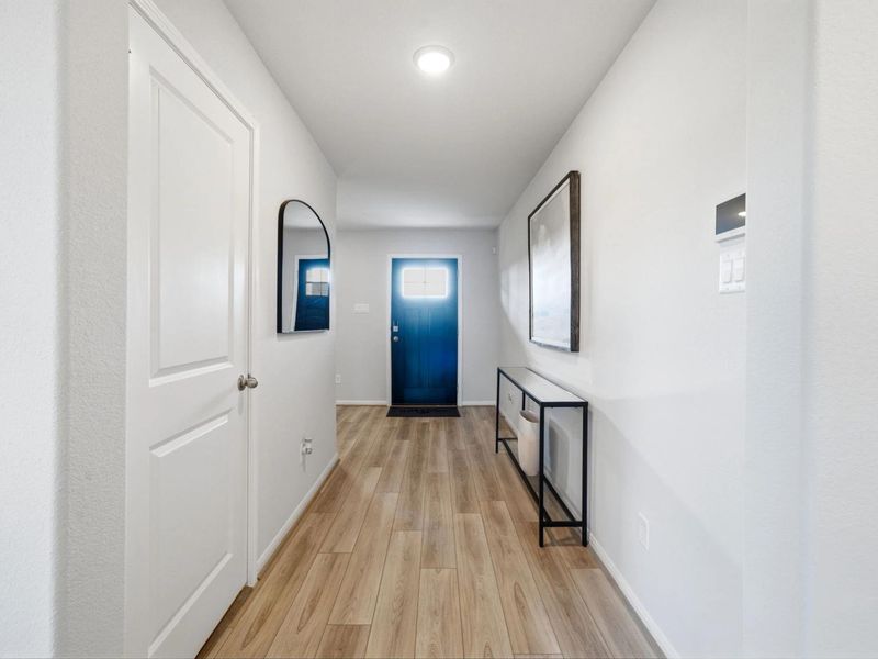 Furnished interior in a model home at Sunterra in Katy (Image 8).