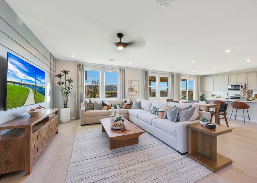 A living room with a large television. A living room with a large television.