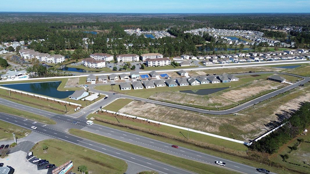 Aerial view of the Carrington Woods community in Longs, SC, showing layout and nearby surroundings (Image 1).